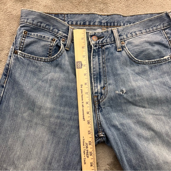 Levi’s 569 Light Wash blue denim distressed Men’s Size 32x32 - Picture 9 of 10